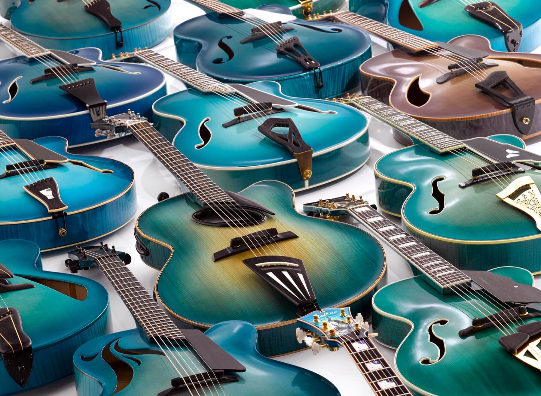 The Chinery Blue Guitar Collection arranged together.