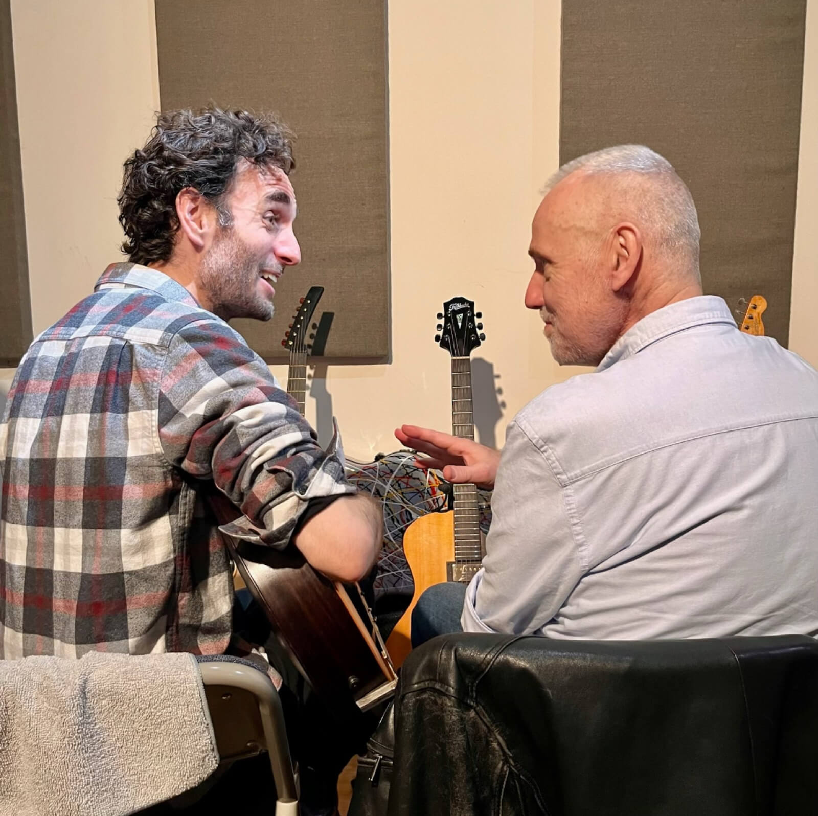 Julian Lage talking with Blue Arch Guitars maker Krzysztof Trzesniowski.